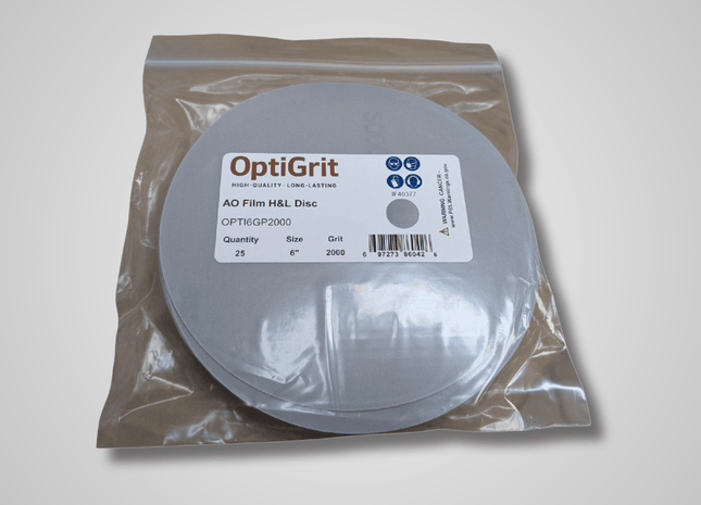 OptiGrit disc in a clear plastic bag on a white background
