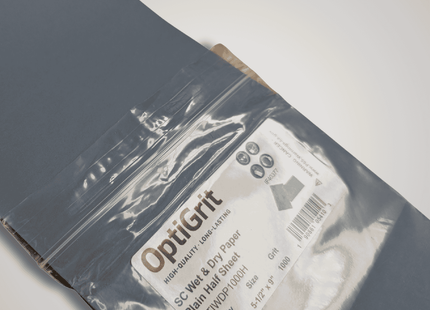OptiGrit sandpaper package with a clear plastic cover on a white background