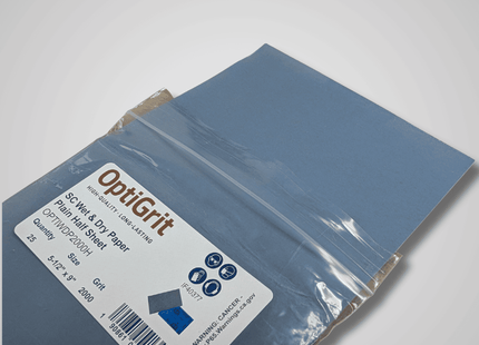 Packaged blue sandpaper with OptiGrit label on a white background
