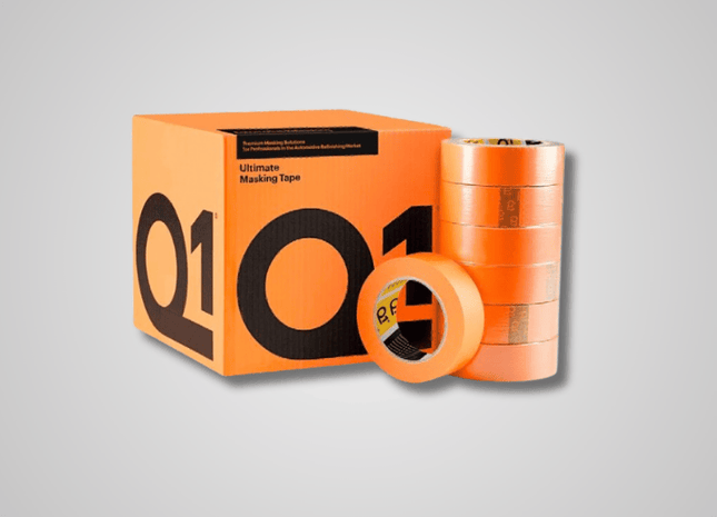 Orange Q1 marking tape with packaging on a gray background